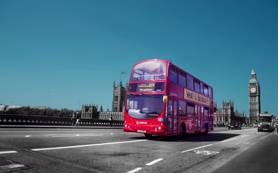 A photo of a London Bus (both bus and coach travel are possible with lightweight mobility scooters.)