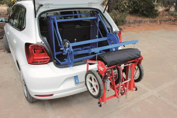 Di Blasi car hoist lifting an R30 mobility scooter into the boot of a car.